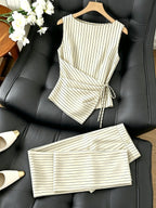 Striped two-piece wide-leg set by 64b136-1e featuring a matching top and pants, perfect for a stylish, casual look.