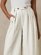 Linen wide-leg pants from 64b136-1e, featuring a relaxed fit and natural fabric in a versatile design.