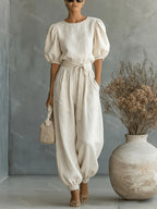 Bohemian puff sleeve jumpsuit by 64b136-1e featuring a relaxed fit, lightweight fabric, and stylish puffed sleeves.