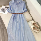 Striped belted shirt dress by 64b136-1e featuring a collar, long sleeves, and a waist belt for a casual, stylish look.