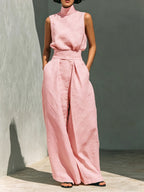 Linen sleeveless two-piece set from 64b136-1e featuring a relaxed fit top and matching wide-leg pants in natural linen fabric.