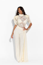 Ivory lace top from 64b136-1e with intricate floral lace details, long sleeves, and elegant design for stylish garden wear.