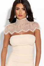 KENSINGTON lace dress in soft pastel with intricate lace details, sleeveless design, and a fitted silhouette.