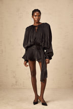 Eugénie fully-pleated ruffled mini dress in Black
