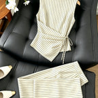 Striped two-piece wide-leg set from 64b136-1e, featuring a matching top and pants in a stylish, casual design.