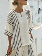 Casual striped lounge set by 64b136-1e featuring a comfortable spring-summer outfit with matching top and pants.