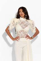 Ivory lace top from Gardenia brand, featuring intricate lace details and a stylish, feminine design perfect for casual or dressy wear.