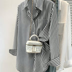 Striped pocket button shirt from 64b136-1e, casual tops with front pocket and button closure in a vibrant striped pattern.