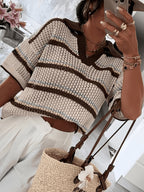 Striped collar sweater from 64b136-1e, a cozy tops piece with multicolored horizontal stripes and a fitted collar.