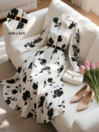 French floral belted maxi dress by 64b136-1e, featuring a flowy fabric, floral print, and waist belt, perfect for summer wear.