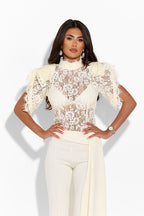 Ivory lace top from the Gardenia collection by 64b136-1e, featuring intricate lace details, long sleeves, and a feminine fit.