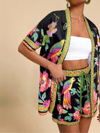 Tropical Breeze short sleeve top and shorts set from 64b136-1e, featuring vibrant tropical print and casual summer style.