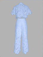 Elegant hollow lace blouse for women, stylish fashion top featuring intricate lace details and a chic, feminine design.