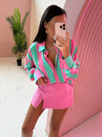 Pink and green striped women's summer top by 64b136-1e featuring a casual, lightweight design with short sleeves.