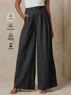 Light beige linen wide-leg pants from 64b136-1e, featuring a relaxed fit and flowing fabric, perfect for casual or summer wear.