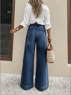 Wide-cuff stretch denim jeans from 64b136-1e featuring a relaxed fit and classic blue wash, displayed on a neutral background.