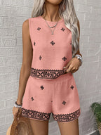 Chic print sleeveless vest and shorts two-piece set by 64b136-1e, featuring a stylish sleeveless top and matching shorts.