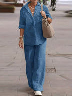 64b136-1e cardigan and wide-leg pants set featuring a cozy cardigan and flowing trousers in a stylish coordinated look.