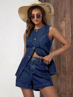 Denim cardigan and shorts set by 64b136-1e, featuring a light blue denim fabric, long sleeves, and matching high-waisted shorts.