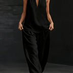 Linen top and wide-leg pants set by 64b136-1e, featuring a relaxed fit and breathable fabric, shown on a model.