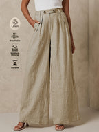 Linen wide-leg pants by 64b136-1e, stylish and comfortable bottoms with a relaxed fit, shown in natural linen fabric.