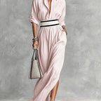 French beltless high-slit dress from 64b136-1e featuring a flowing silhouette and elegant design, shown on a model.