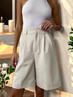 Elegant Bermuda shorts by 64b136-1e, featuring a stylish design, tailored fit, and comfortable fabric suitable for casual wear.