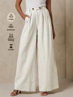 Light beige linen wide-leg pants from 64b136-1e, showcasing a relaxed fit and flowing fabric perfect for casual or summer wear.