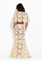 Beige Amira floral top by 64b136-1e, featuring a lightweight fabric and delicate floral pattern.