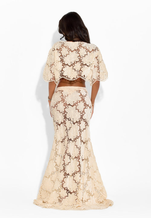 Beige Amira floral maxi skirt from 64b136-1e bottoms collection, flowing fabric with a floral pattern and elastic waistband.