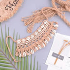 Colorful crochet seashell collar choker from 64b136-1e, featuring intricate seashell designs for beach-inspired accessories.