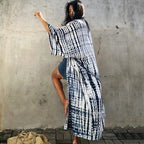 Printed loose kimono cardigan from 64b136-1e, featuring a flowy fit, long sleeves, and stylish printed design.