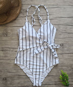 Colorful one-piece swimsuit by 64b136-1e, featuring a stylish design perfect for swimwear and beachwear.