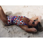 Colorful one-piece swimwear by 64b136-1e featuring a sleek design, shown in multiple vibrant colors.
