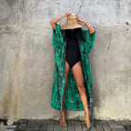 Printed loose kimono cardigan from 64b136-1e, featuring lightweight fabric, flowy design, and vibrant print pattern.