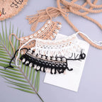 Colorful crochet seashell collar choker accessory featuring intricate shell design, perfect for beach or boho fashion styles.