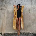 Printed loose kimono cardigan from 64b136-1e, featuring lightweight fabric and floral pattern, ideal for stylish layered tops.