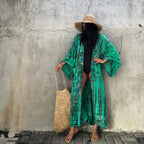 Printed loose kimono cardigan from 64b136-1e Tops, featuring flowy fabric and vibrant floral print for casual style.