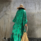 Printed loose kimono cardigan from 64b136-1e, showcasing lightweight fabric, relaxed fit, and stylish floral print.
