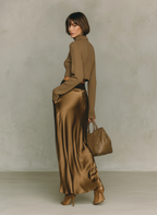 Women's Fashionable Gold-brown Turtleneck Long-sleeved Knit Top Paired With A Satin Midi Skirt MDA0982L5AN