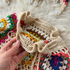Two-piece knitted beach set from 64b136-1e, featuring a stylish top and bottom perfect for summer beachwear.
