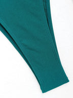 Colorful ring bandeau bikini swimwear from 64b136-1e, featuring a stylish bandeau top in multiple vibrant shades.