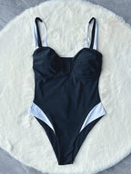 Two-piece push-up swimwear by 64b136-1e, featuring stylish design and supportive fit for beach or pool.
