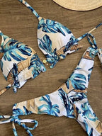 Boho tassel bottom bikini from 64b136-1e in various prints, featuring stylish swimwear with tassel details and vibrant patterns.