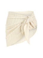Sheer bikini wrap skirt in three colors, stylish swimwear piece from 64b136-1e brand, lightweight and semi-transparent for beachwear.