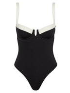 Two-piece and one-piece push-up bathing suits by 64b136-1e, featuring stylish swimwear designs for a flattering fit.