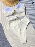 Pink one-piece swimsuit with matching skirt from 64b136-1e, stylish swimwear for beach or poolside wear.