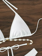 Triangle bikini set with seashell accents, featuring adjustable straps and vibrant swimwear design by 64b136-1e.