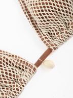 Contrast fishnet bikini set from 64b136-1e swimwear, featuring a stylish fishnet design and bikini top and bottom.