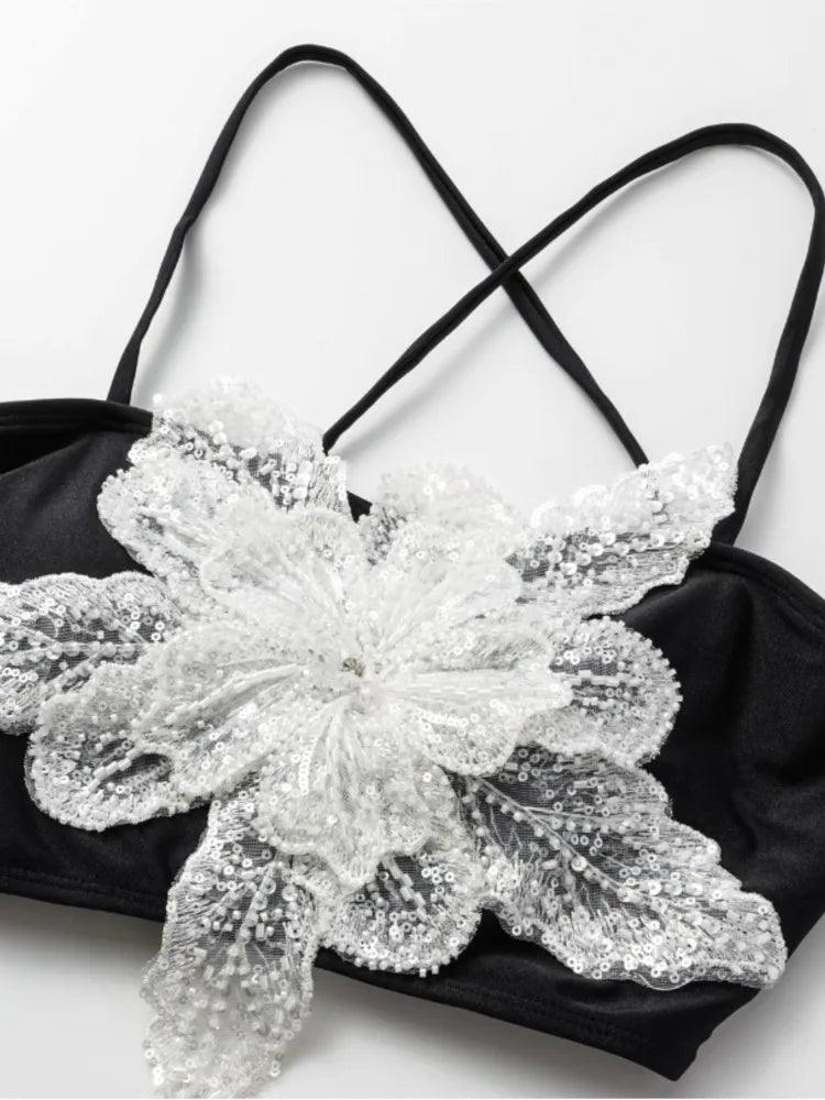 OUINA FLOWER SWIMWEAR AND RUFFLED SKIRT